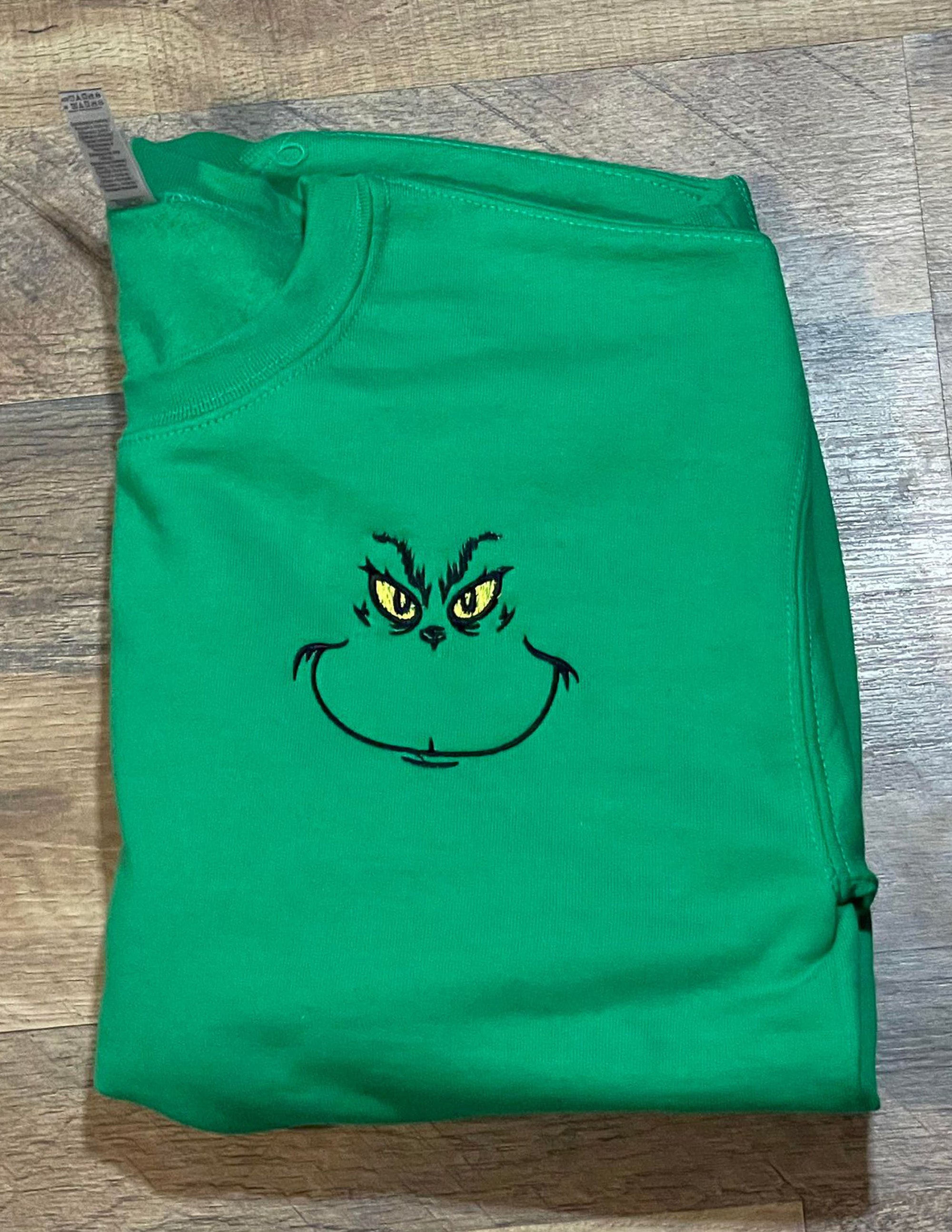 il_2000xN.5481588630_rtpd-2.jpg Embroidered Grinch Face Christmas Sweatshirt