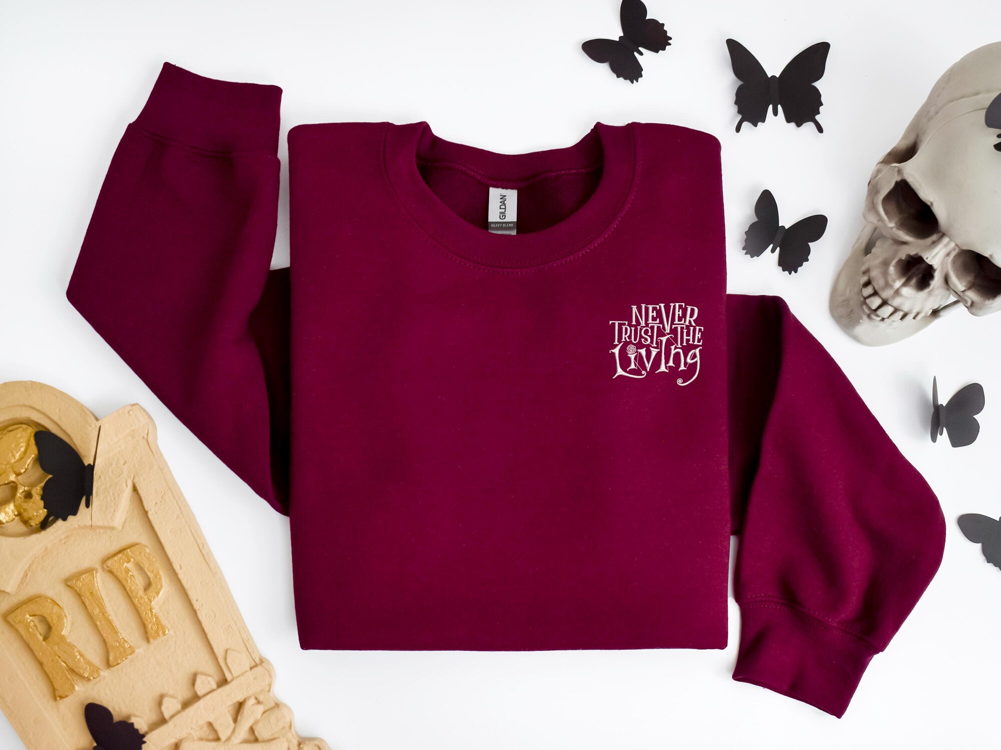 il_2000xN.6155340642_cv4j.jpg Embroidered Halloween Sweatshirt: Never Trust The Living Gothic Pullover