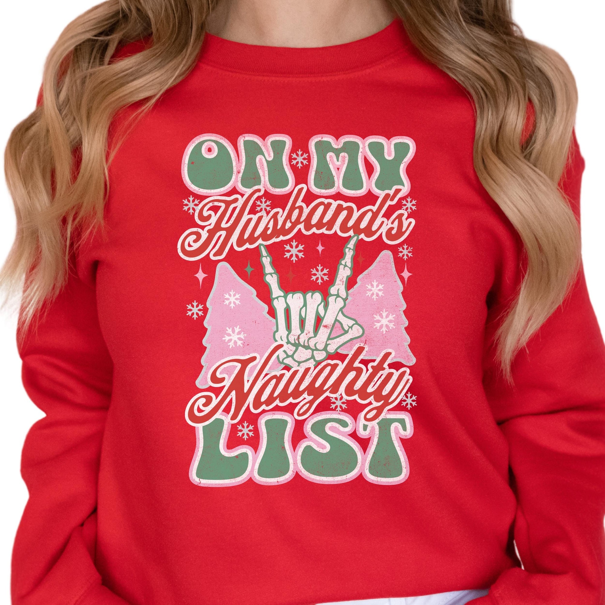 On My Husband’s Naughty List Christmas Shirt – Available in T-Shirt, Long Sleeve Tee, or Sweatshirt – Fun Holiday Women’s Gift