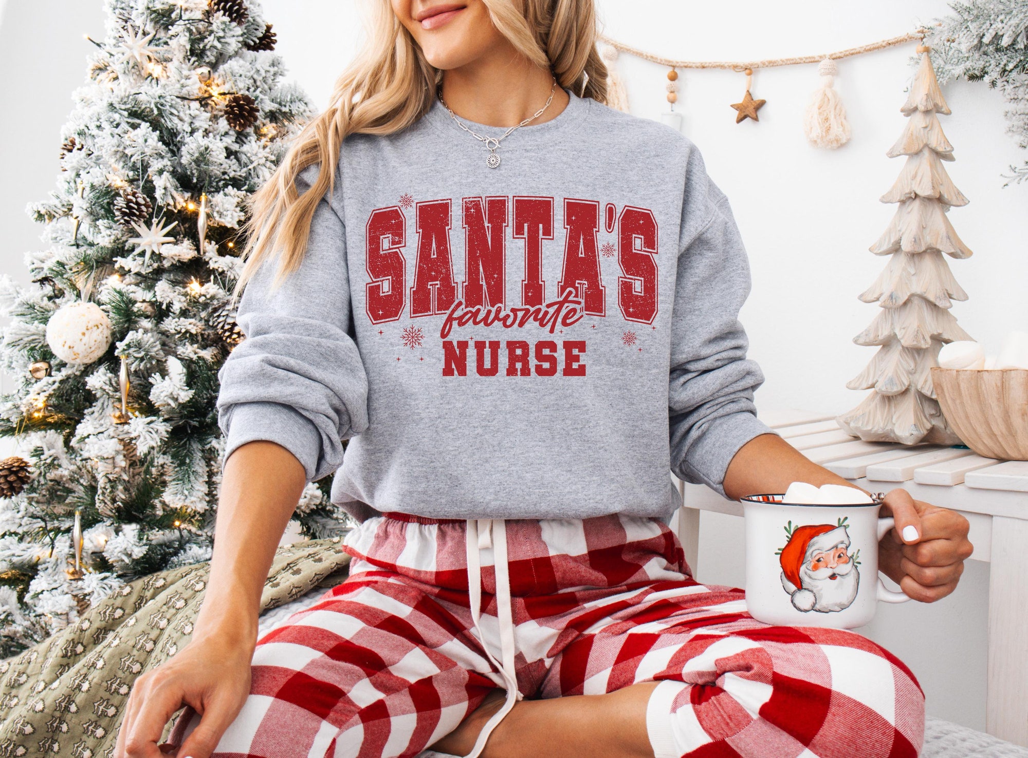 Santa’s Favorite Nurse Christmas Sweatshirt: Holiday Gift for Rn, ICU, NICU, ER Medical Staff