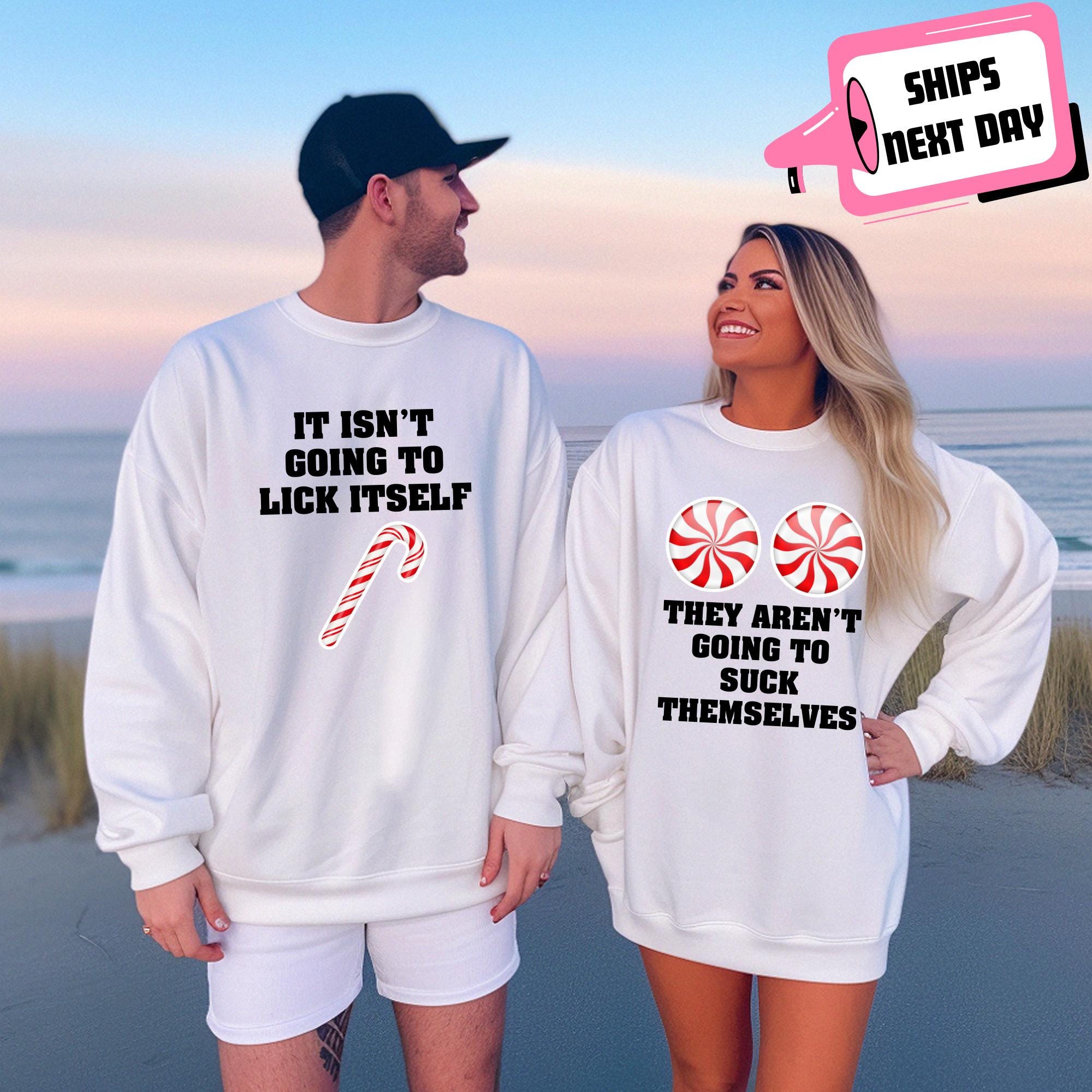 Matching Christmas Couple Sweatshirt They Aren’t Going To Suck Themselves It Isn’t Going To Lick Itself Funny Naughty Gift for Wife Husband
