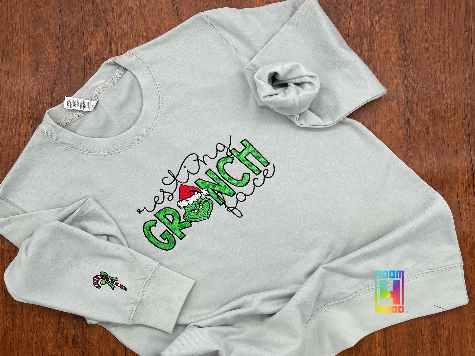 il_2000xN.6444645061_3z2s.jpg Christmas Sweatshirt, Whoville Embroidered Sweatshirt, Christmas Embroidery Sweatshirt, Crewneck, Sleeve candy cane, resting face grinch