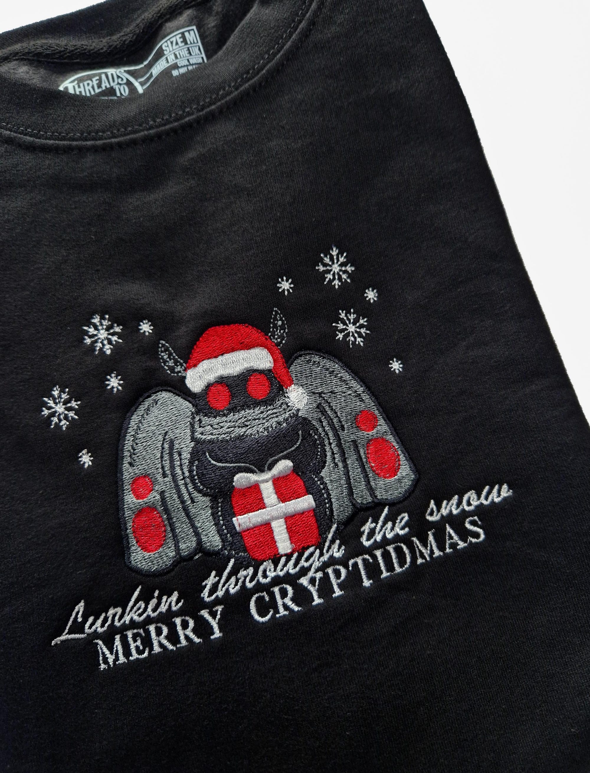 il_2000xN.6481199625_b7w3-1.jpg Merry Cryptidmas Mothman Christmas Sweatshirt