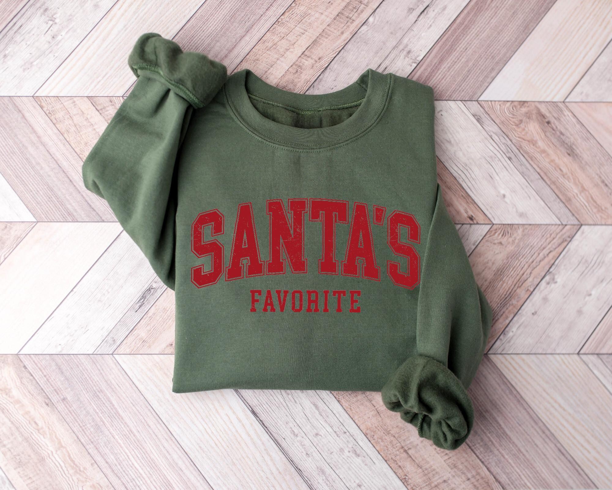 il_2000xN.7048743727_kl8r-1.jpg Santas Favorite Christmas Sweatshirt, Christmas Shirt, Womens Christmas Shirt, Christmas Gift, Funny Christmas Shirt, Festive Holiday Gift