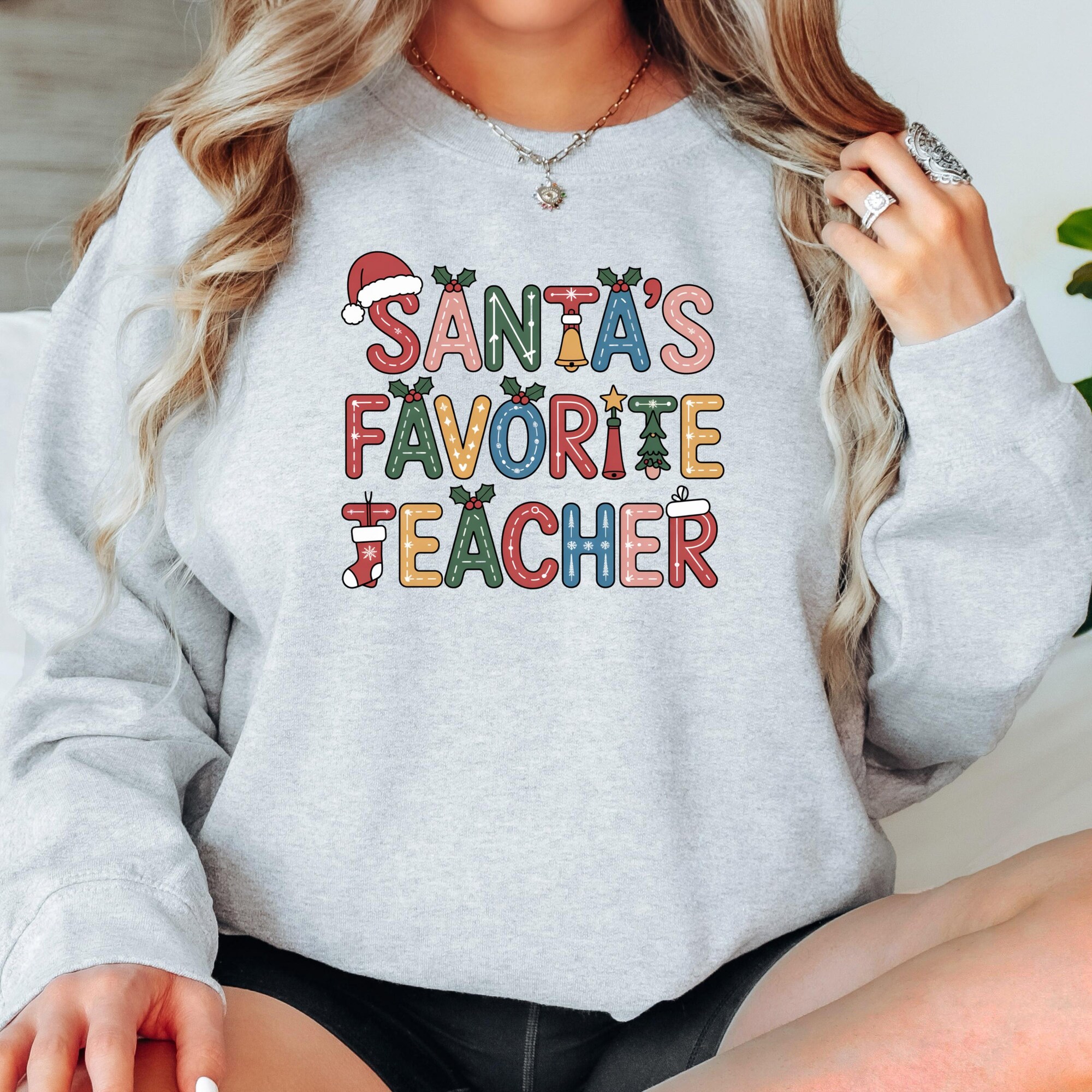Santa’s Favorite Teacher Sweatshirt: Christmas Holiday Tee