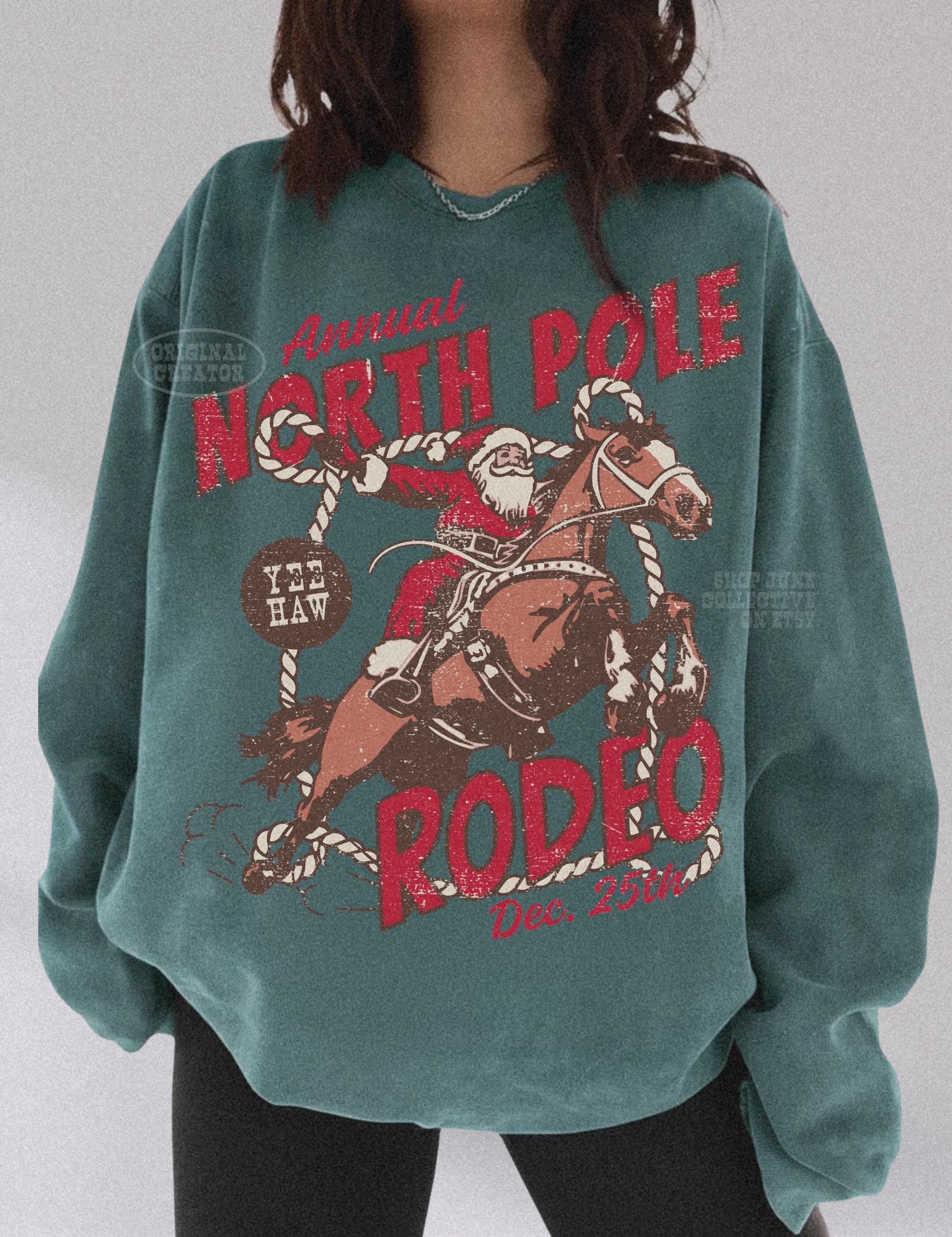 North Pole Rodeo Crewneck Comfort Colors® Country Christmas Western Christmas Cowboy Santa Claus Shirt Vintage Groovy Festive Sweatshirt