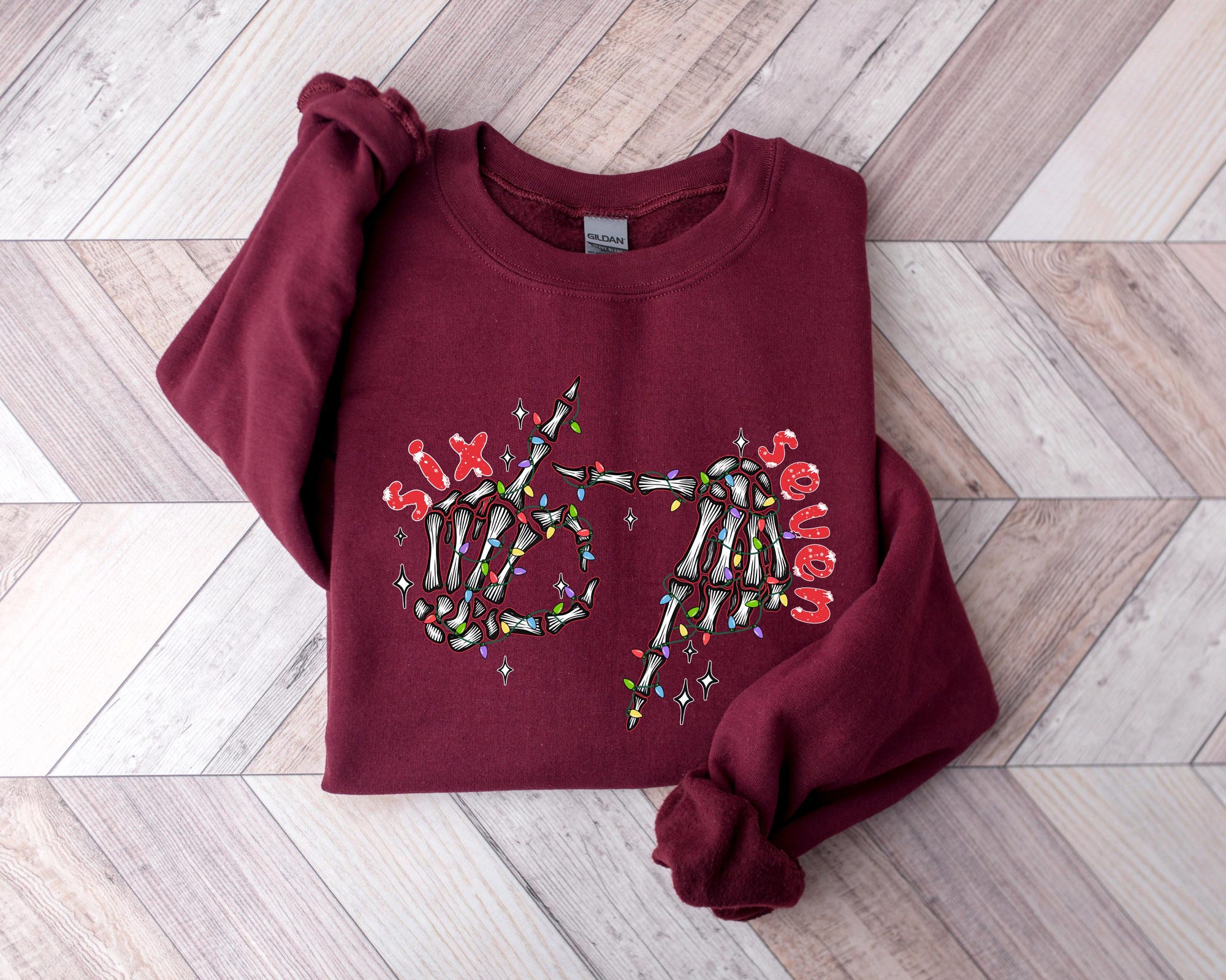il_2000xN.7302157461_28wj-1.jpg Funny Christmas Skeleton Hands Sweatshirt: 6 7 Meme Holiday Shirt