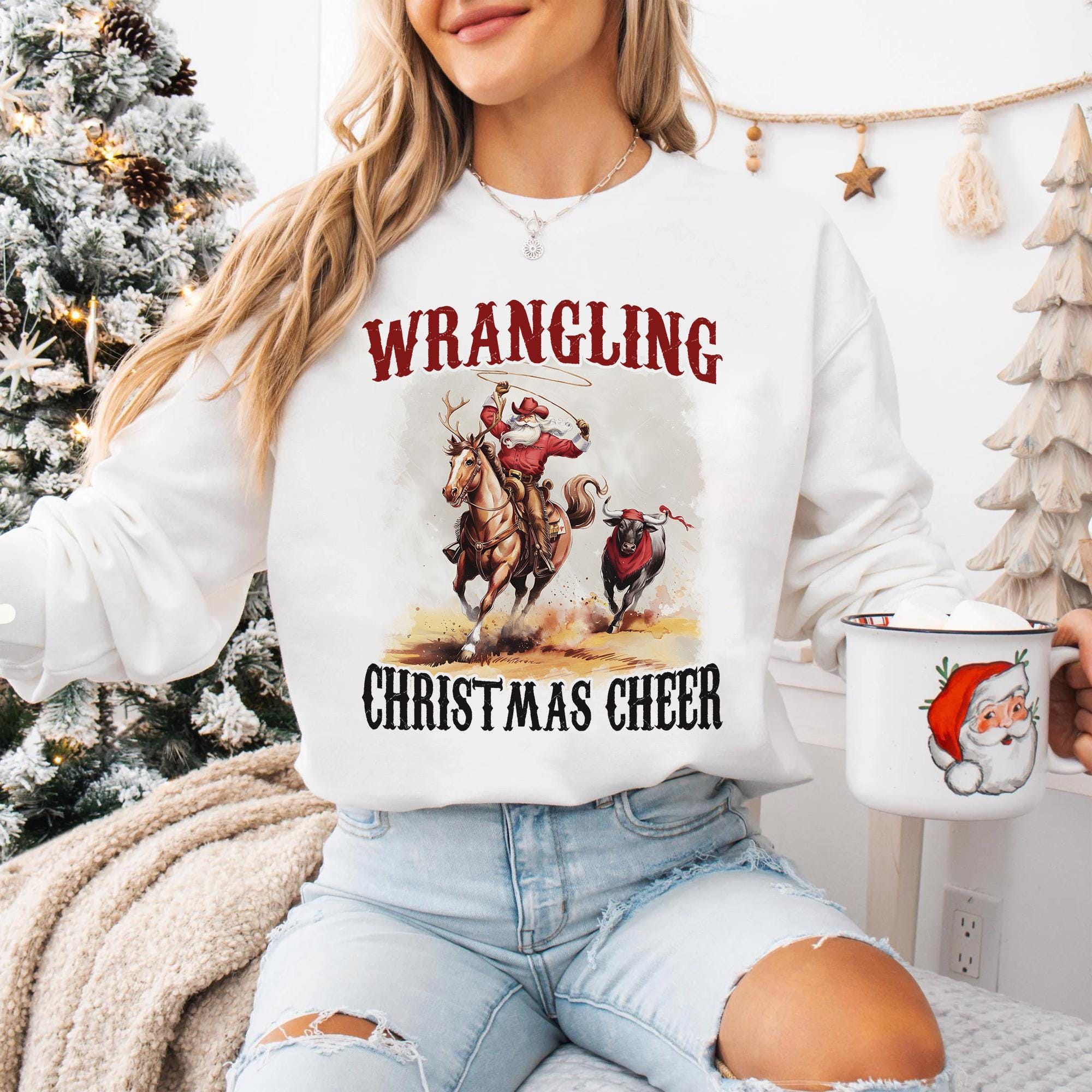 il_2000xN.7315246377_sgh3.jpg Wrangling Christmas Cheer Sweatshirt, estern Christmas Shirt, Cowboy Santa Shirt,Funny Christmas Shirt,Holiday Christmas Sweatshirt,Xmas Tee