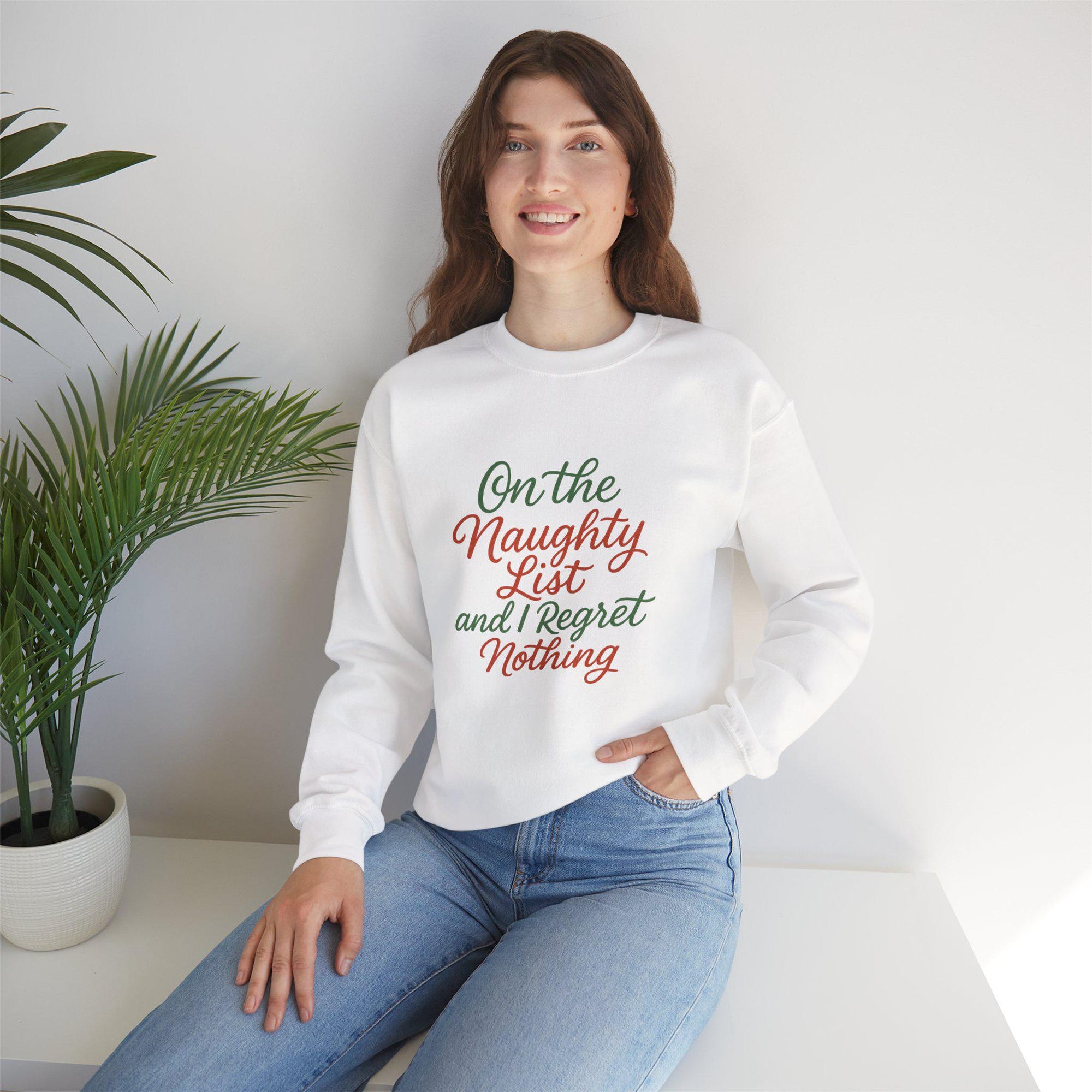 Holiday Cheer Sweatshirt – “On the Naughty List and I Regret Nothing” – Funny Gift, Cozy Crewneck, Christmas Apparel, Cozy Christmas Gift